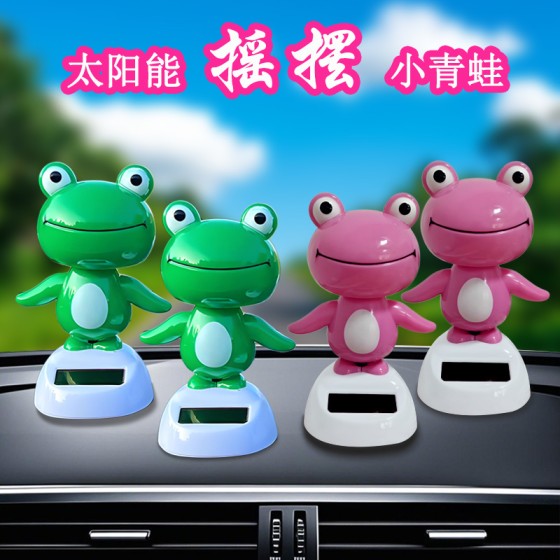 solar frog car decorative items in the carot car car decorative items in the car.